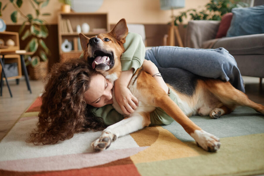 5 Healthy Habits to Help Reduce Stress 2 Girl Playing with Happy Dog Fooling Around on Floor at Home