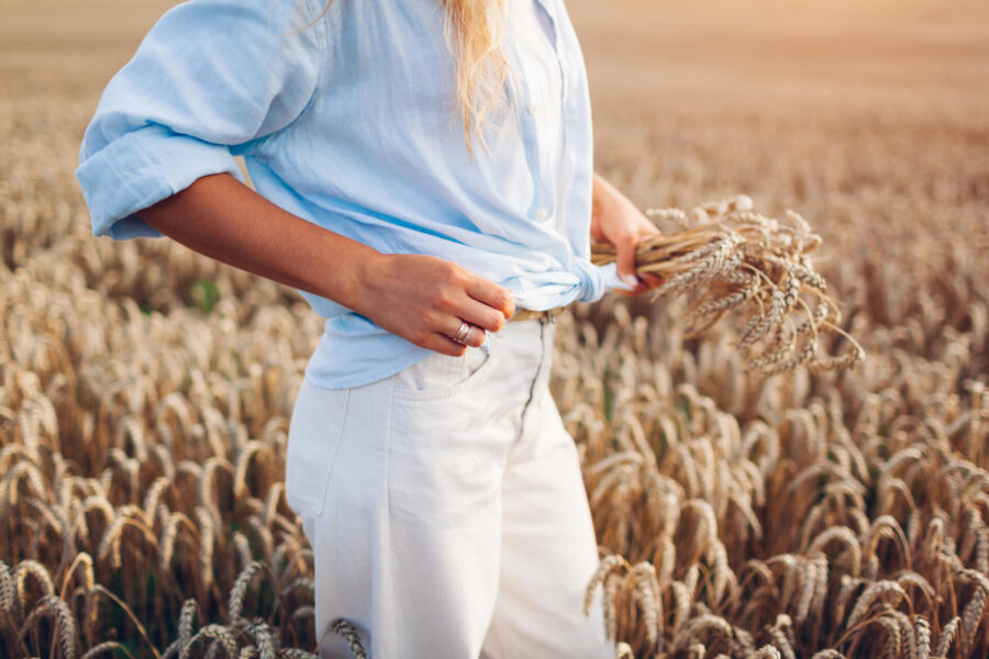 Exploring Sustainable Fashion Materials 2 woman walking in field with linen clothes