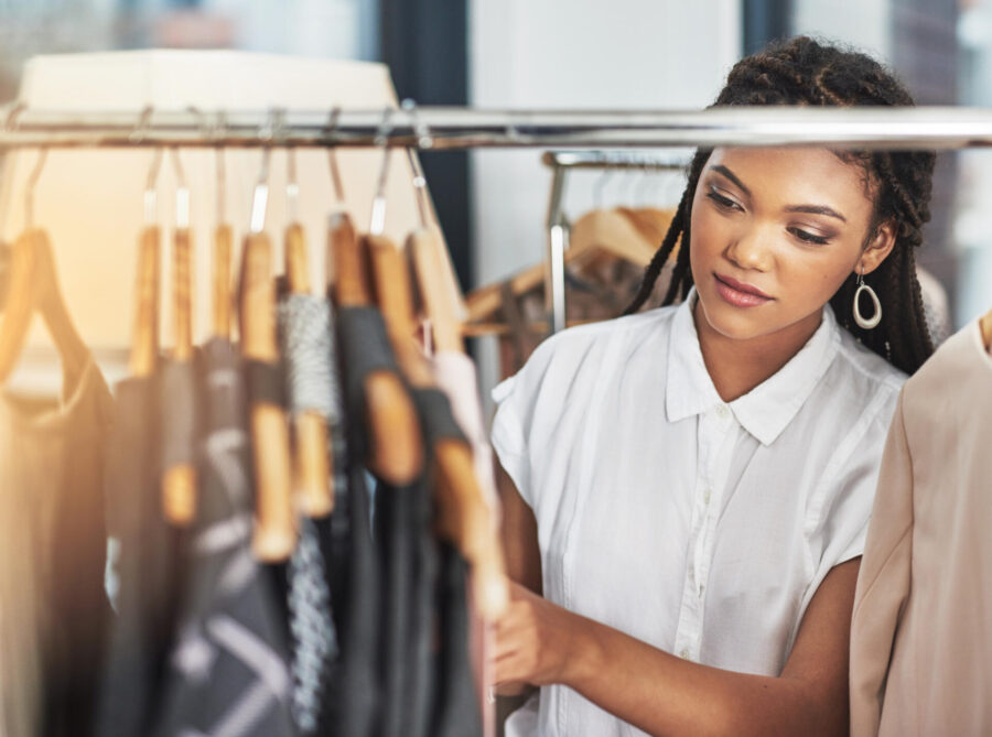 Your Guide to Shopping for Less 8 Woman shopping on a budget