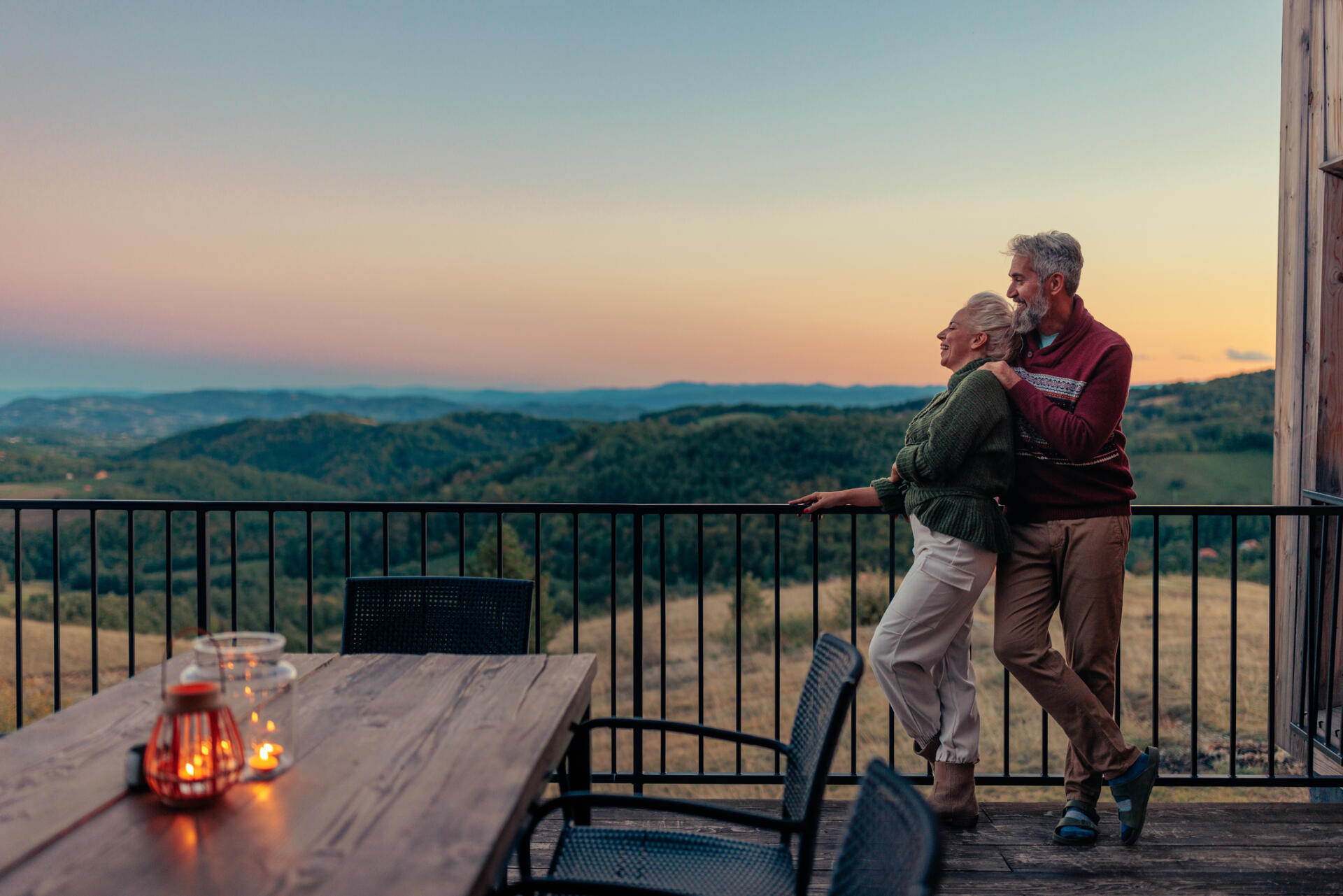 Couple enjoying retirement at mountain getaway.